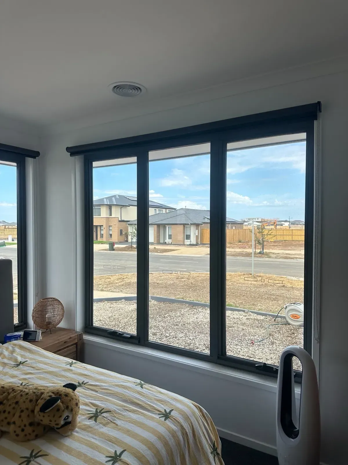 Blockout roller blinds in a Melbourne bedroom